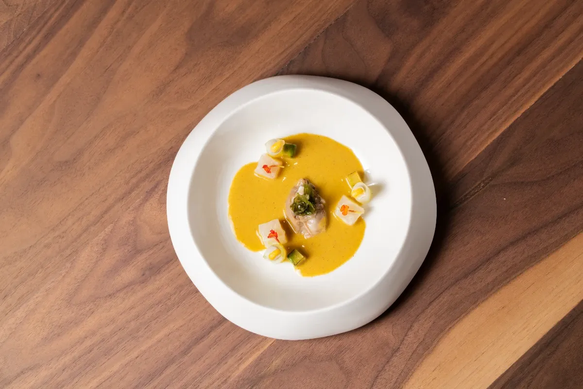 Ostra y sopa de maíz